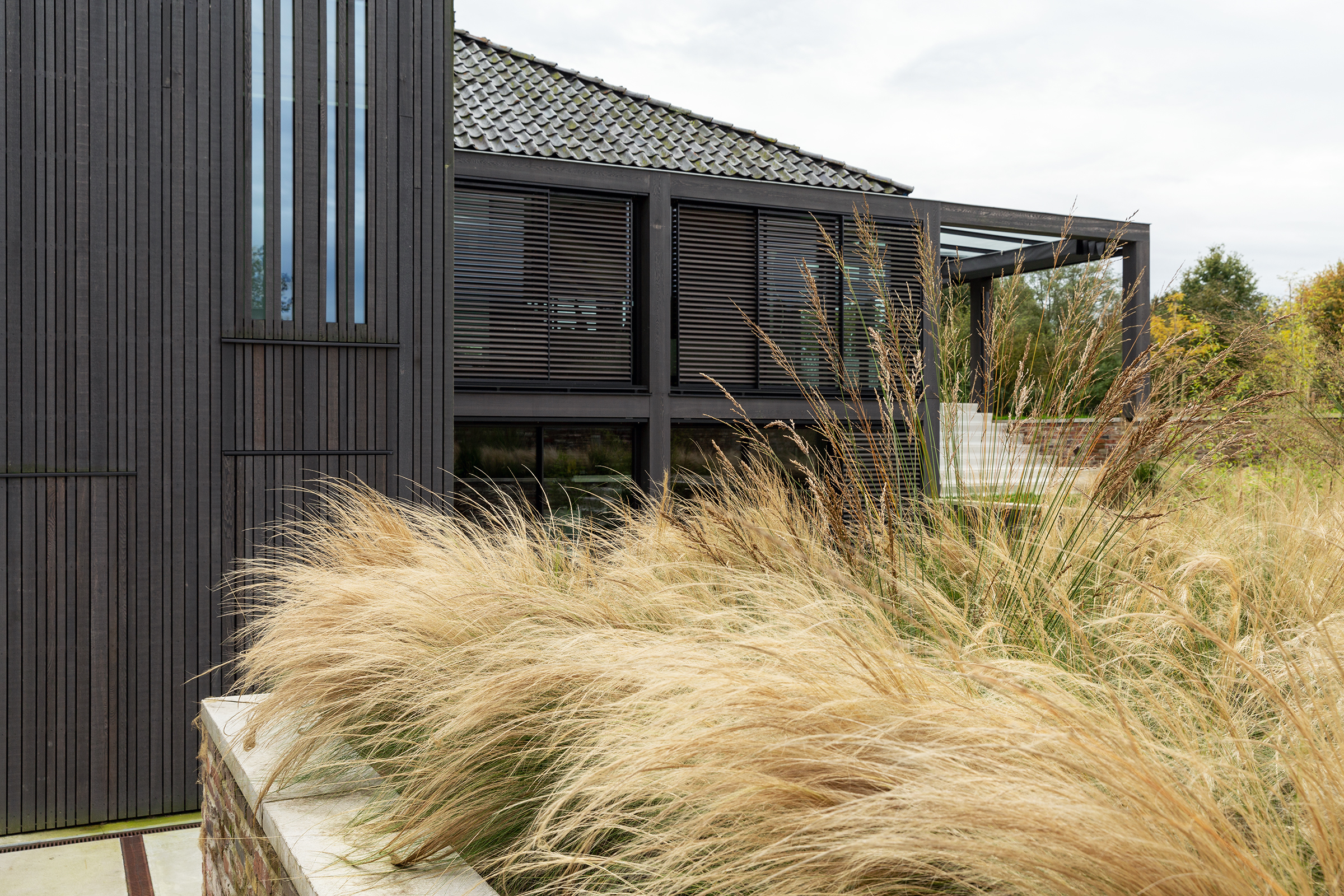 Buitenwonen. Onderhoudsvriendelijk tuinontwerp landschap